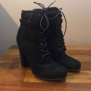 Black suede high heeled booties